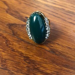 Green golden ring with diamonds